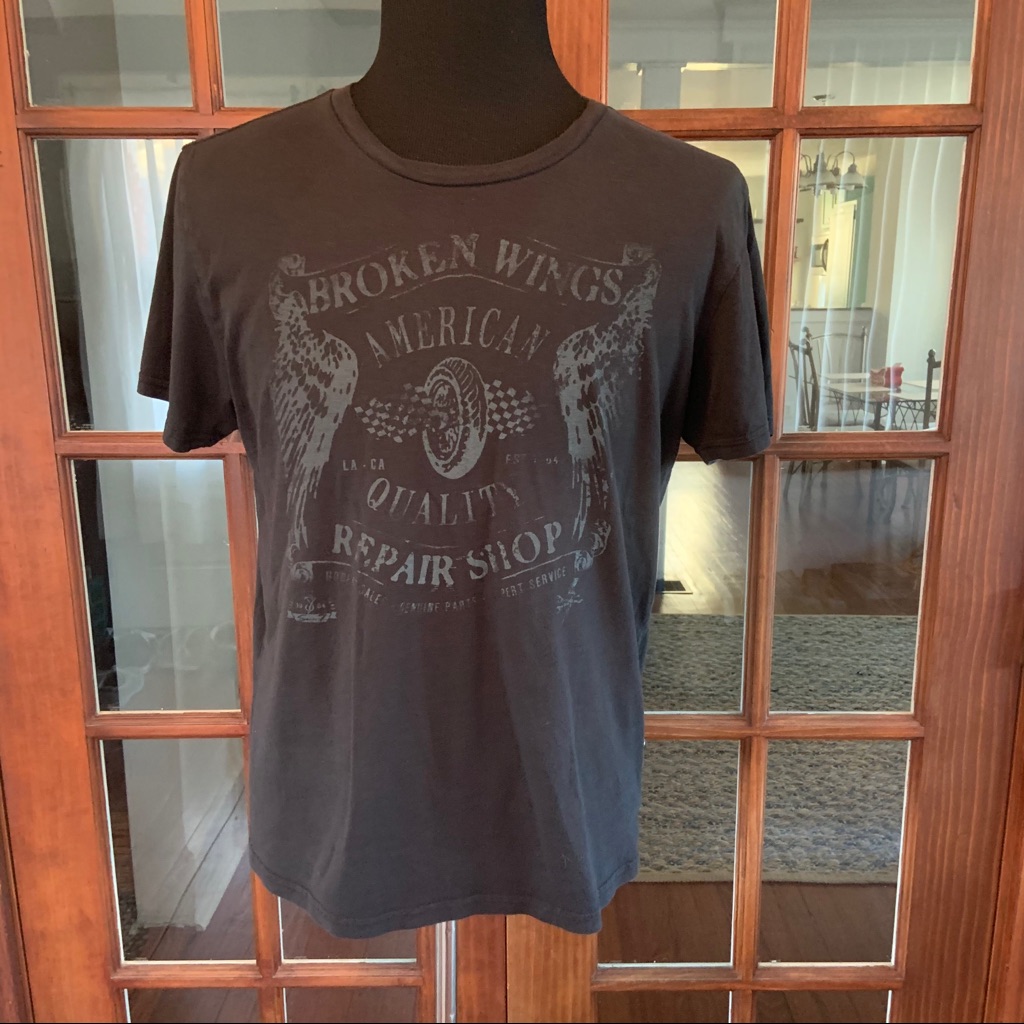 Broken Wings Repair Shop T Shirt